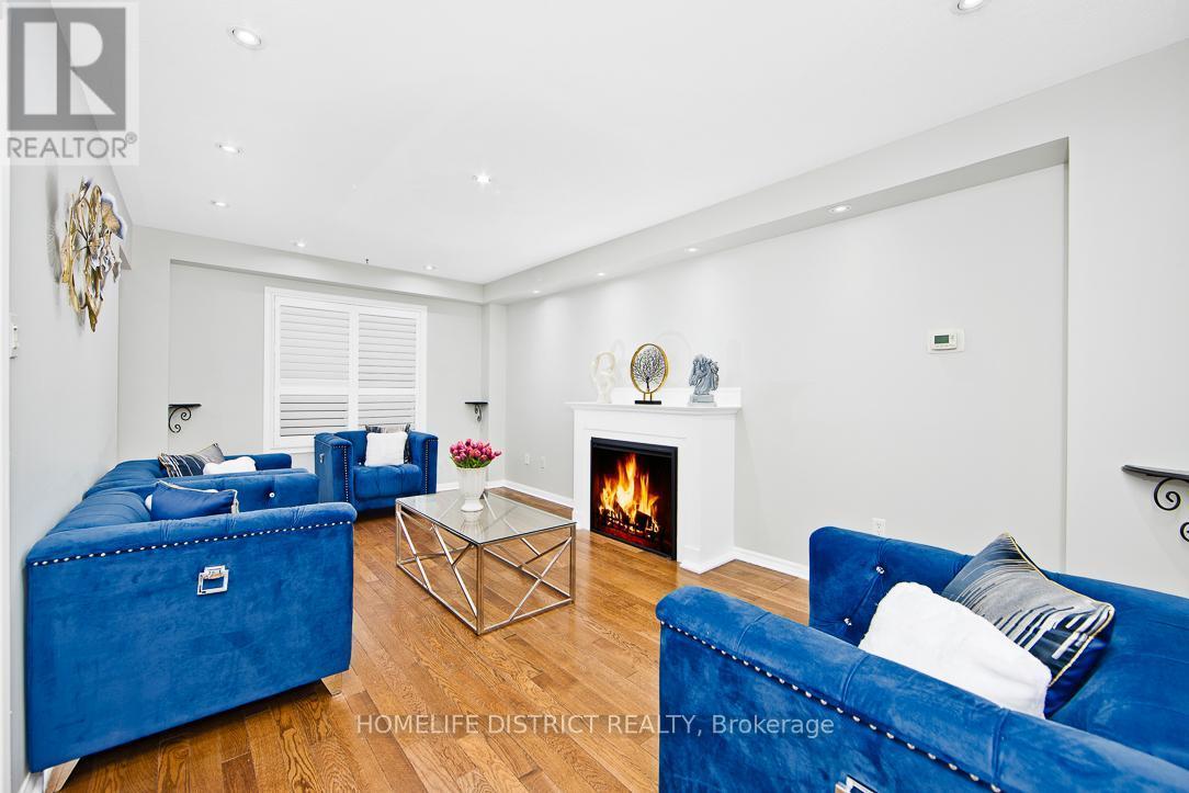 50 Weldrick Crescent, Clarington, ON - Indoor Photo Showing Living Room With Fireplace