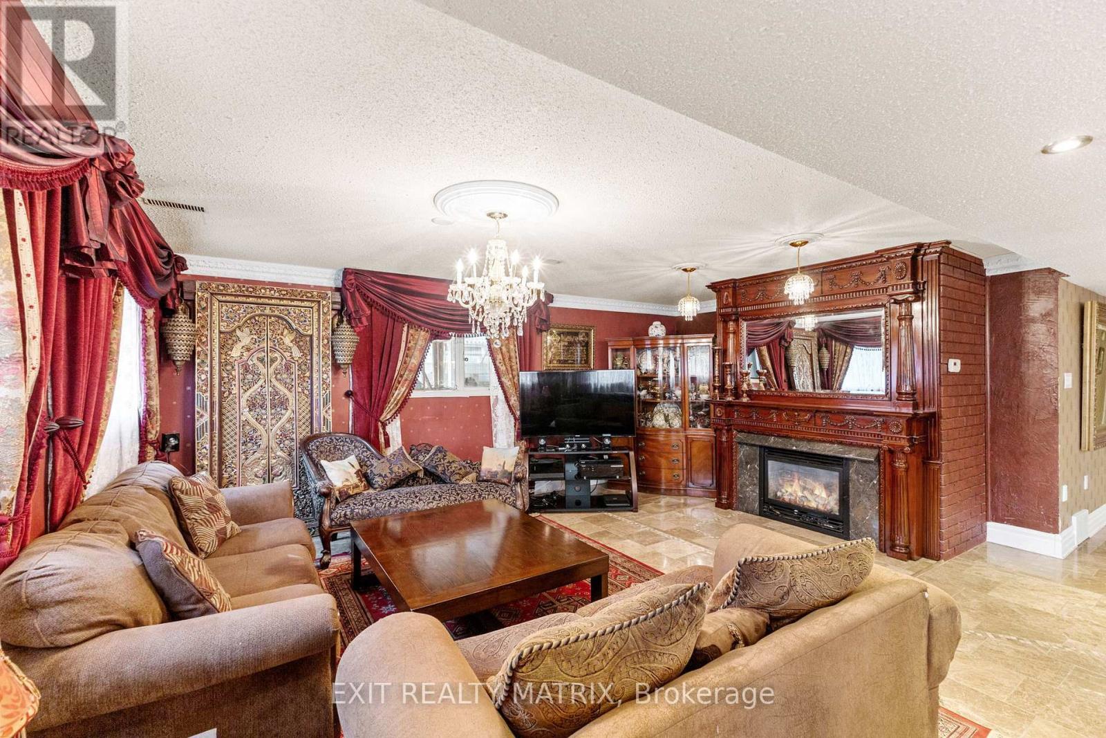 1100 Moffatt Drive, Ottawa, ON - Indoor Photo Showing Living Room With Fireplace