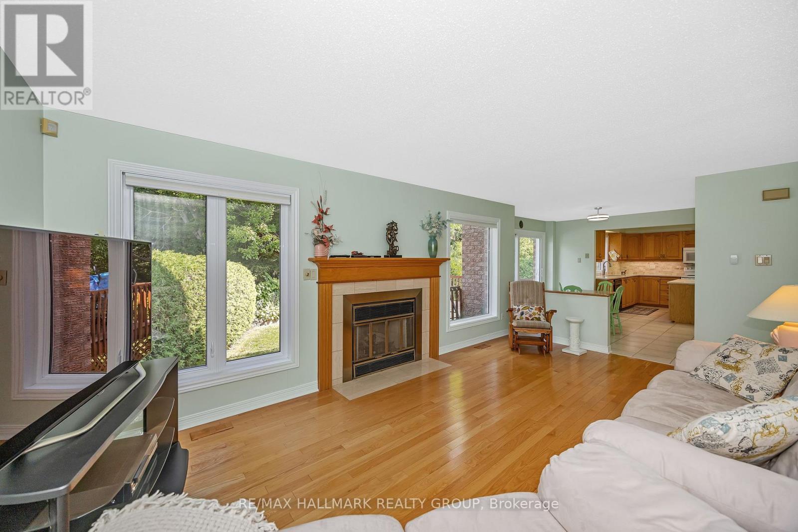 1725 Autumn Ridge Drive, Ottawa, ON - Indoor Photo Showing Living Room With Fireplace