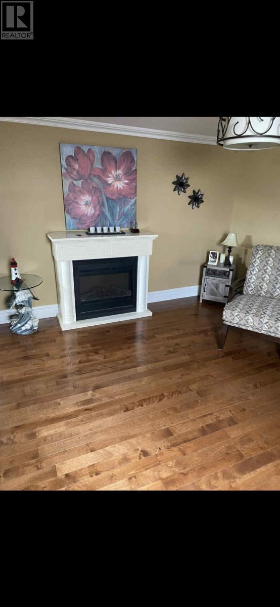 74 Harbour Drive, Fogo Island, NL - Indoor With Fireplace