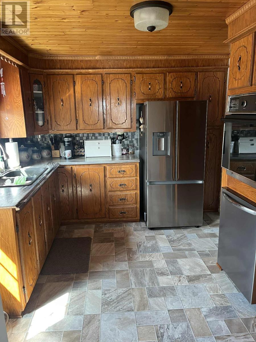 74 Harbour Drive, Fogo Island, NL - Indoor Photo Showing Kitchen With Double Sink