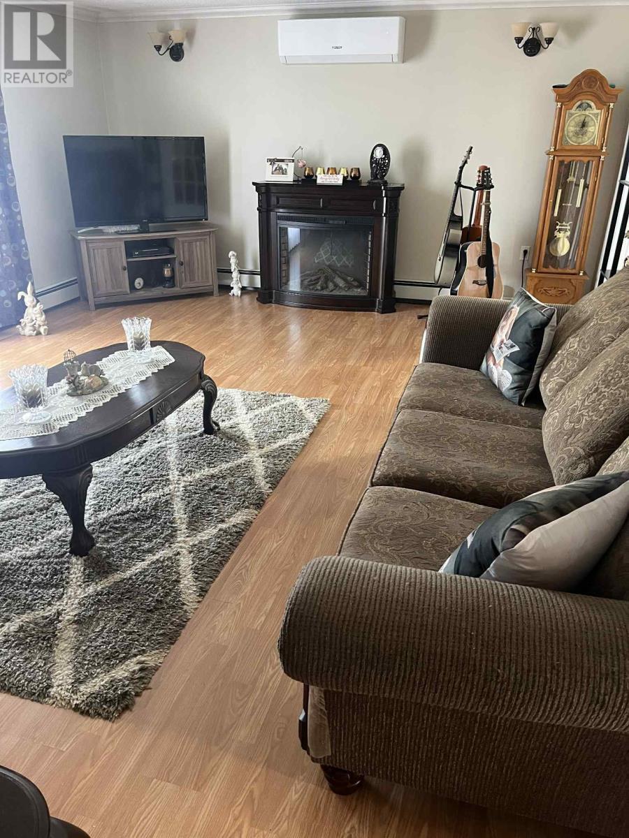 74 Harbour Drive, Fogo Island, NL - Indoor Photo Showing Living Room With Fireplace