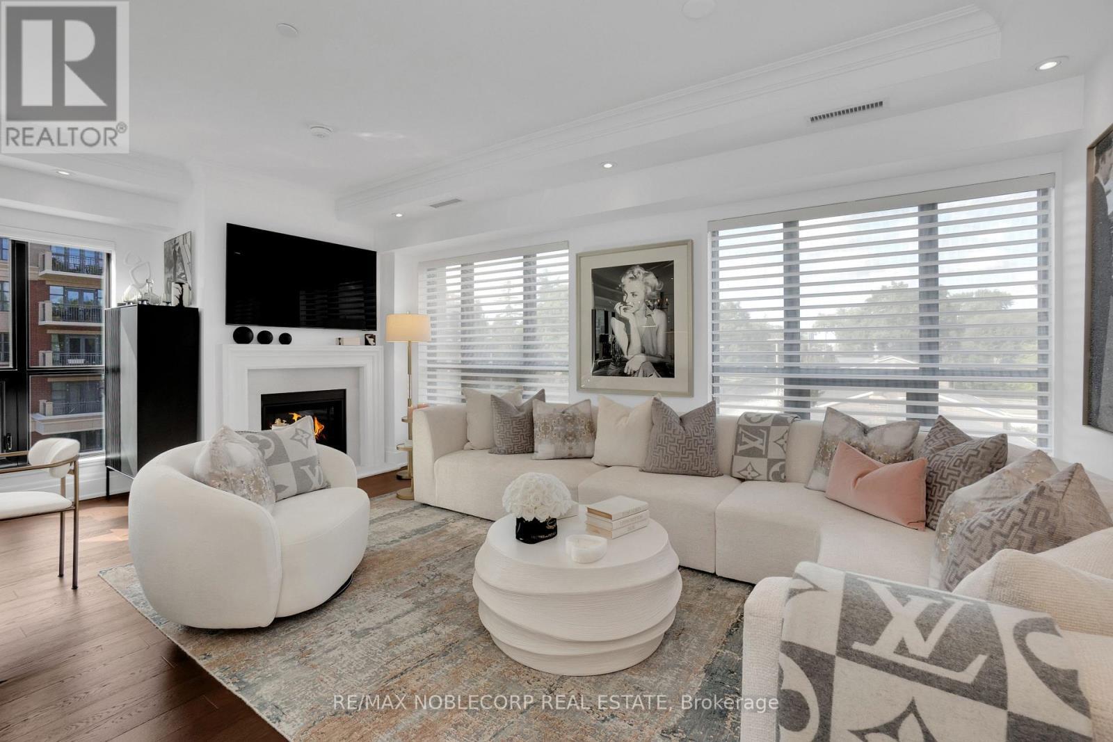 404 - 4 The Kingsway, Toronto, ON - Indoor Photo Showing Living Room With Fireplace