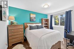 Second Bedroom Overlooks Backyard. -