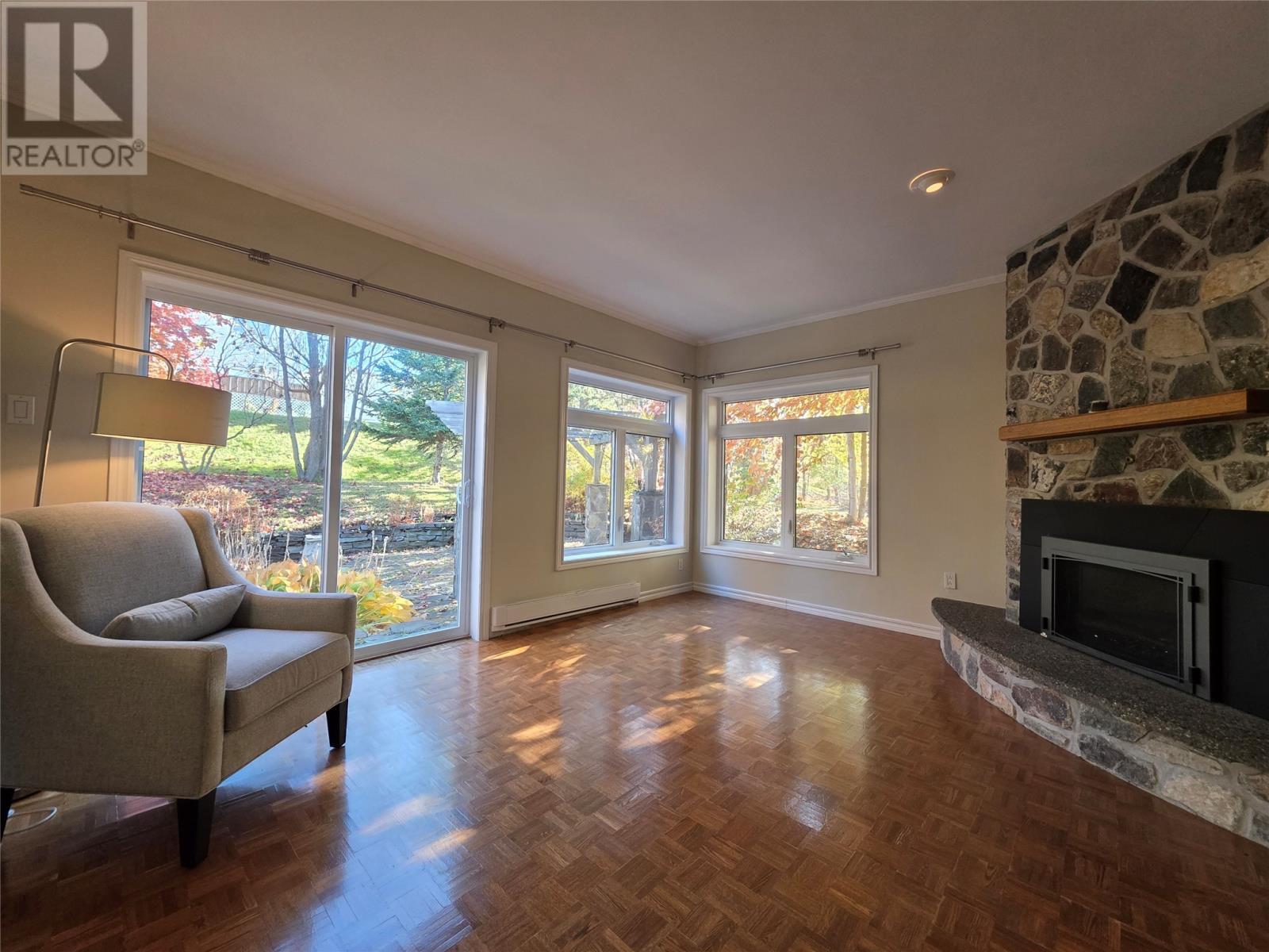 5 Hamilton Place, Corner Brook, NL - Indoor Photo Showing Living Room With Fireplace