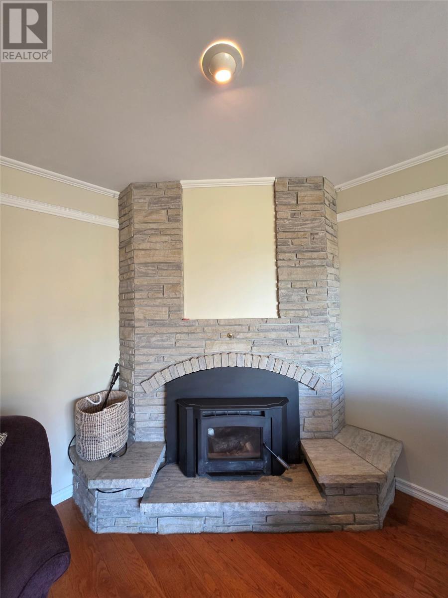 5 Hamilton Place, Corner Brook, NL - Indoor Photo Showing Living Room With Fireplace