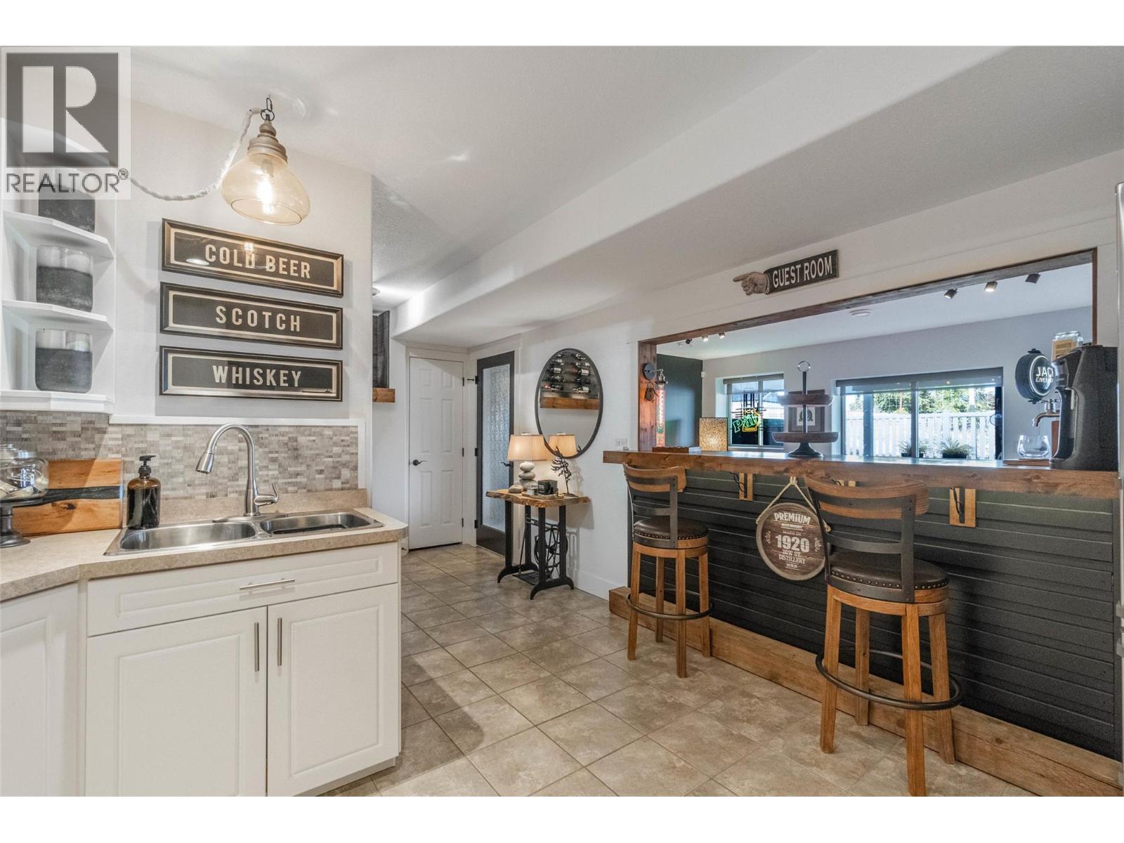 6963 Chardonnay Place, Oliver, BC - Indoor Photo Showing Kitchen With Double Sink