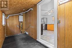 Rear entry mud room with new on demand HWT -