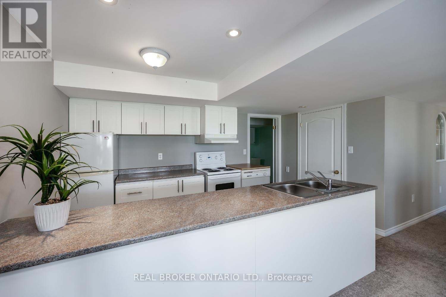 69 Padfield Drive, Clarington (Bowmanville), ON - Indoor Photo Showing Kitchen With Double Sink