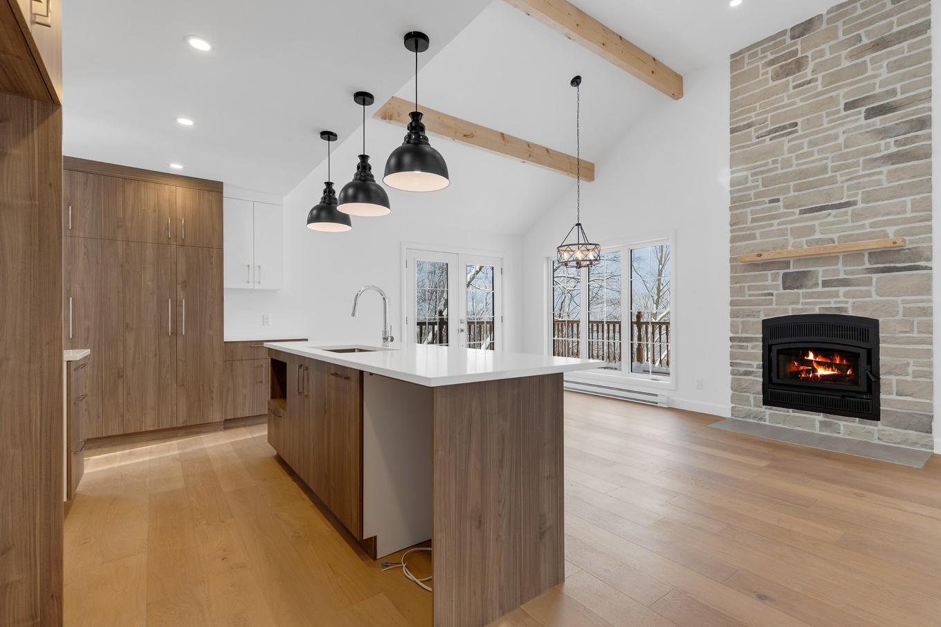 Kitchen - Rue Paulsen, Sainte-Agathe-Des-Monts, QC - Indoor With Fireplace