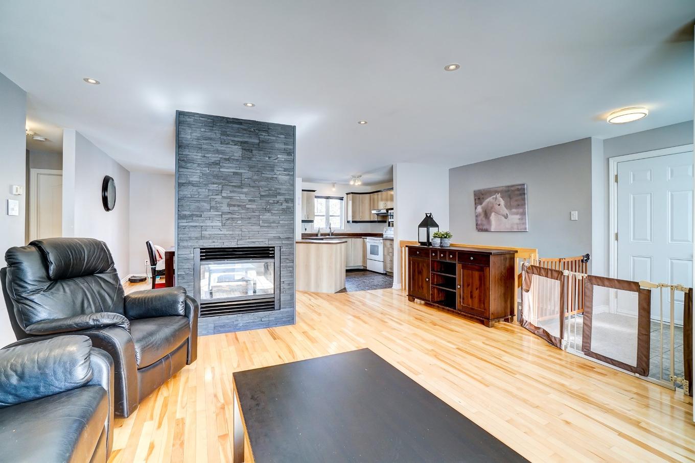 Living room - 412 Rue Chagnon, Gatineau (Aylmer), QC - Indoor Photo Showing Living Room With Fireplace
