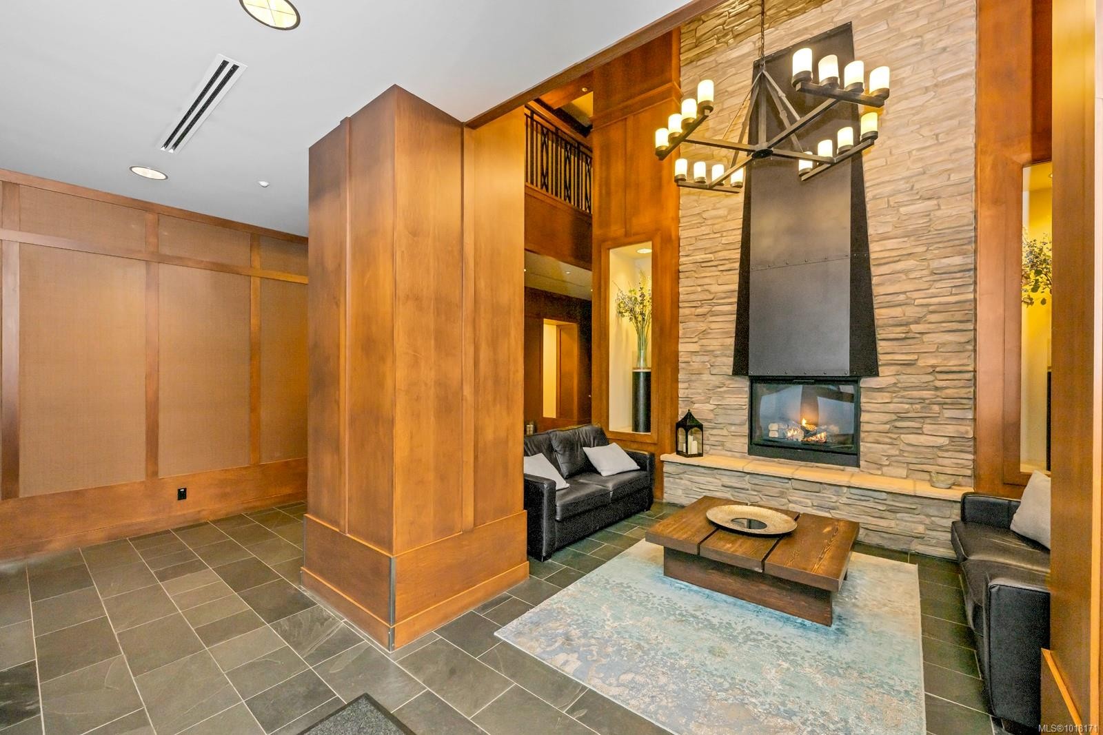 802-1400 Lynburne Pl, Langford, BC - Indoor Photo Showing Other Room With Fireplace