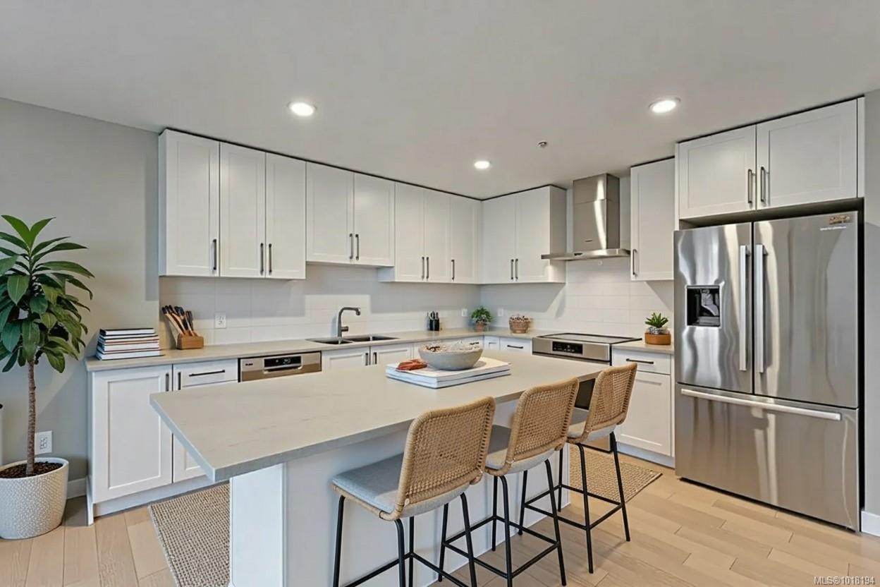 604-3529 Dolphin Dr, Nanoose Bay, BC - Indoor Photo Showing Kitchen With Double Sink