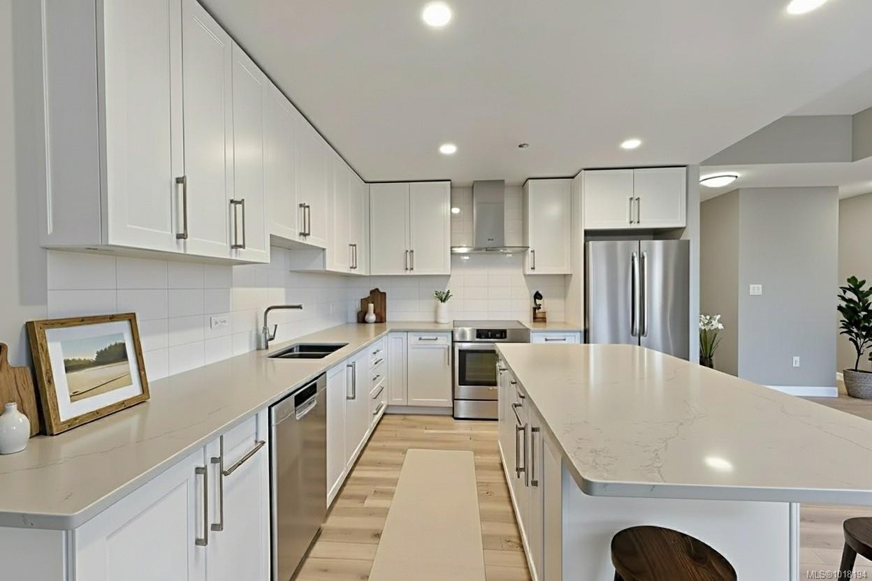 604-3529 Dolphin Dr, Nanoose Bay, BC - Indoor Photo Showing Kitchen With Double Sink With Upgraded Kitchen