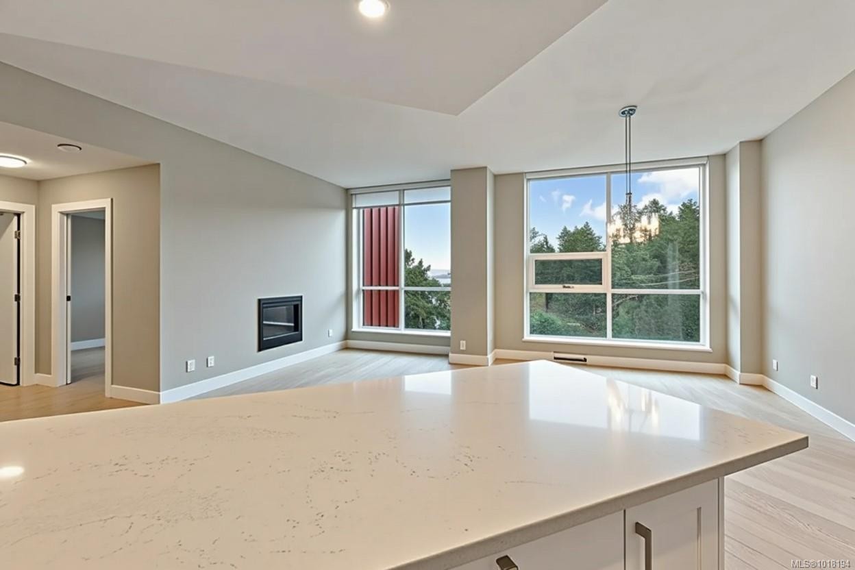 604-3529 Dolphin Dr, Nanoose Bay, BC - Indoor With Fireplace