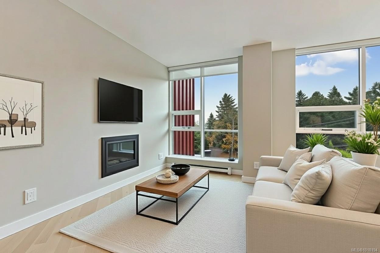 604-3529 Dolphin Dr, Nanoose Bay, BC - Indoor Photo Showing Living Room With Fireplace