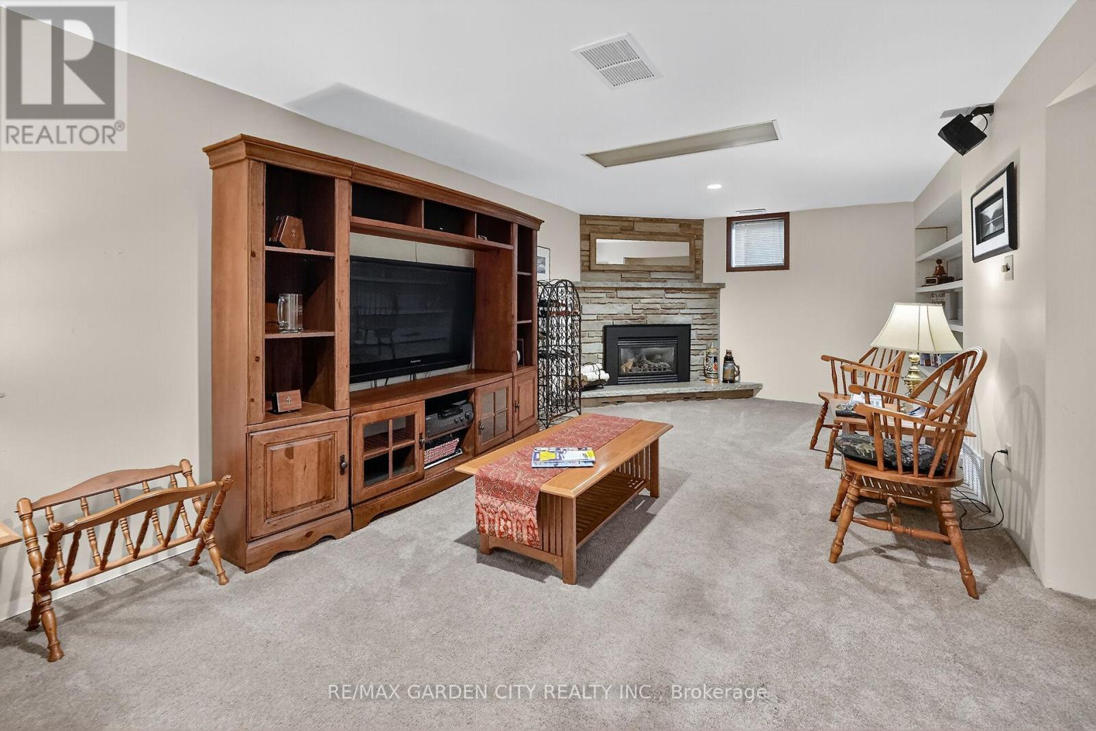 120 Kinross Street, Haldimand, ON - Indoor Photo Showing Living Room With Fireplace