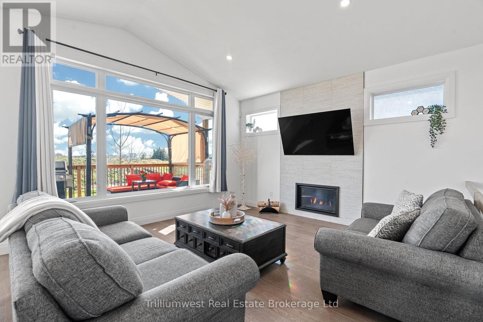 155 Mcleod Street, North Middlesex (Parkhill), ON - Indoor Photo Showing Living Room With Fireplace