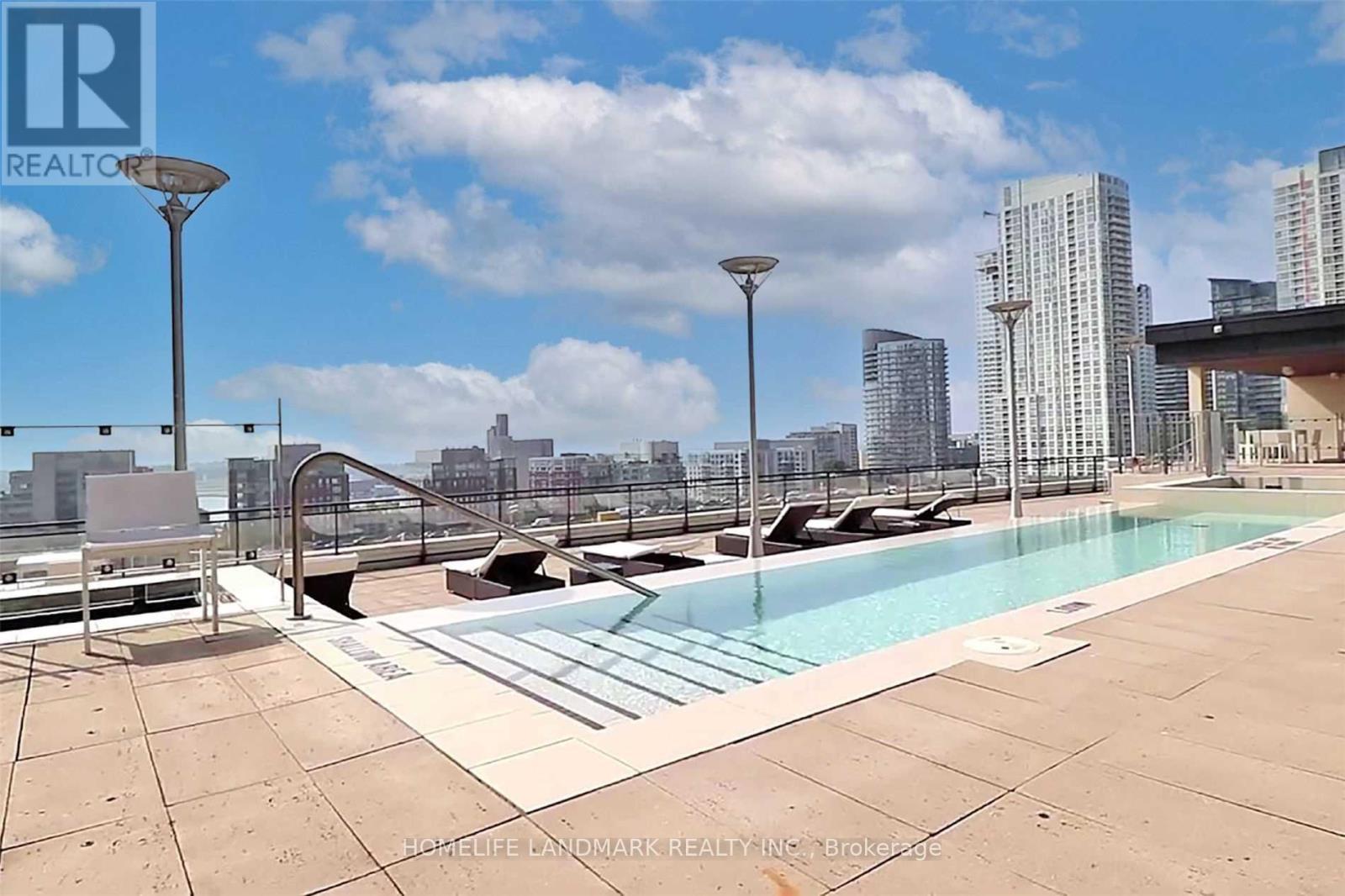 1610 - 8 Telegram Mews, Toronto, ON - Outdoor With In Ground Pool