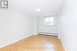 Den, currently used as a bedroom -