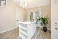 Main Floor Laundry View w/ Walkout to Patio & Pool -