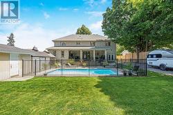 Back Yard View w/ Trailer Parking in Full Bloom -