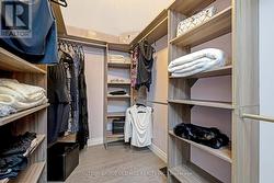 Primary Bedroom Walk-In Closet w/ Organizers View -