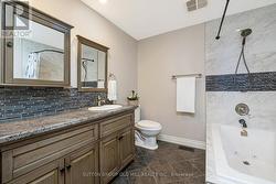 Upper Floor Main Bathroom w/ Skylight & Jet Soaker -