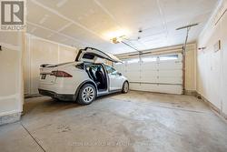 Garage View w/ 8' Insulated Door & 8'8\" Ceiling -