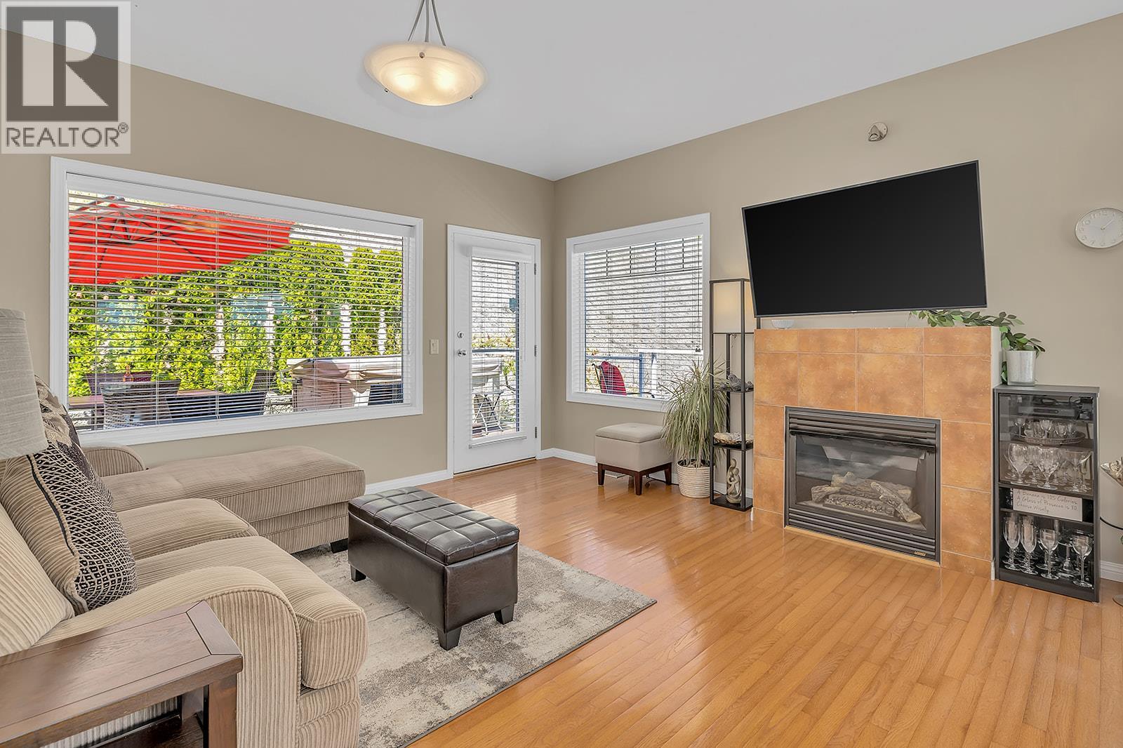 2040 Spyglass Way, West Kelowna, BC - Indoor Photo Showing Living Room With Fireplace