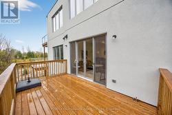 Oversized deck looking onto the greenspace -
