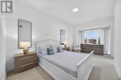 Bedroom 2 with walk-out to the balcony -