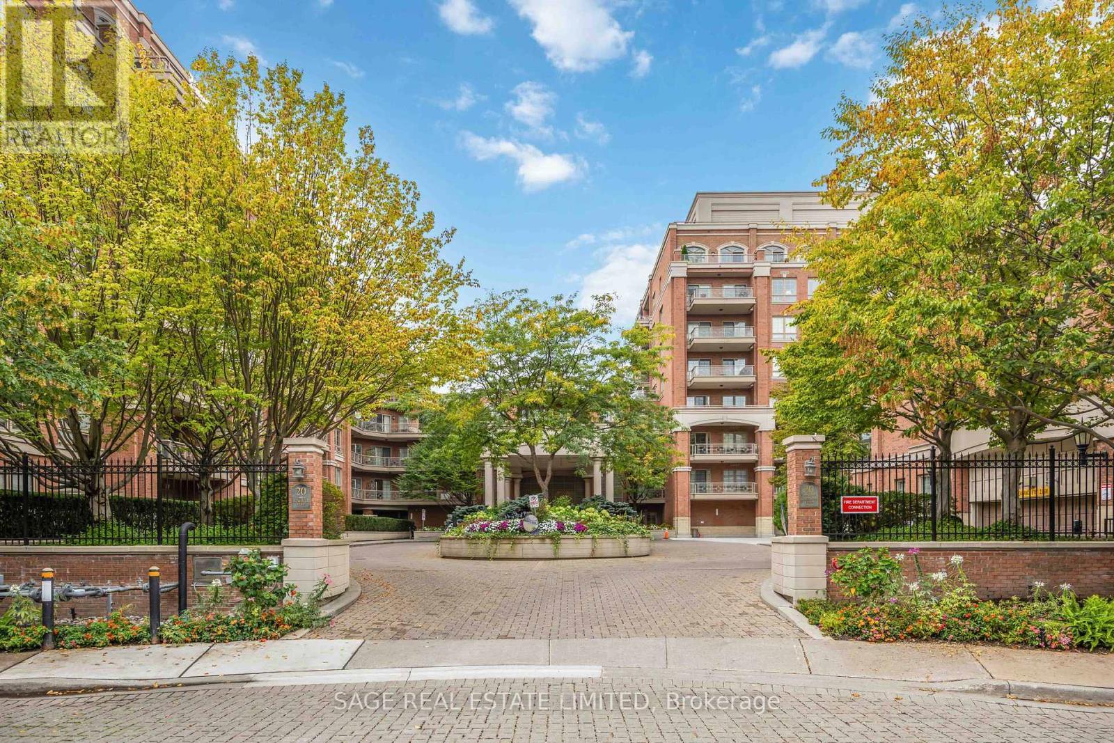 212 - 20 Burkebrook Place, Toronto, ON - Outdoor With Facade