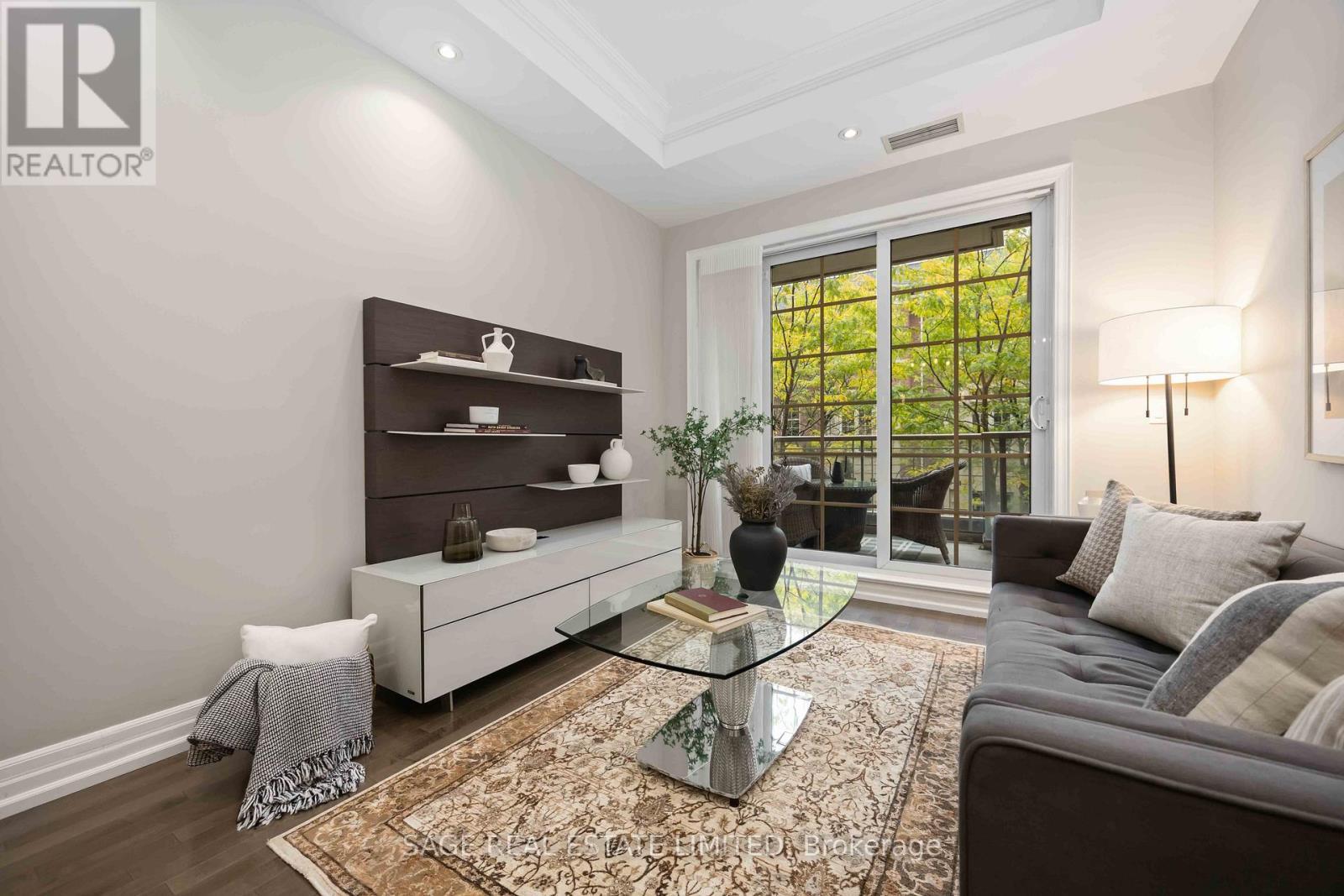 212 - 20 Burkebrook Place, Toronto, ON - Indoor Photo Showing Living Room
