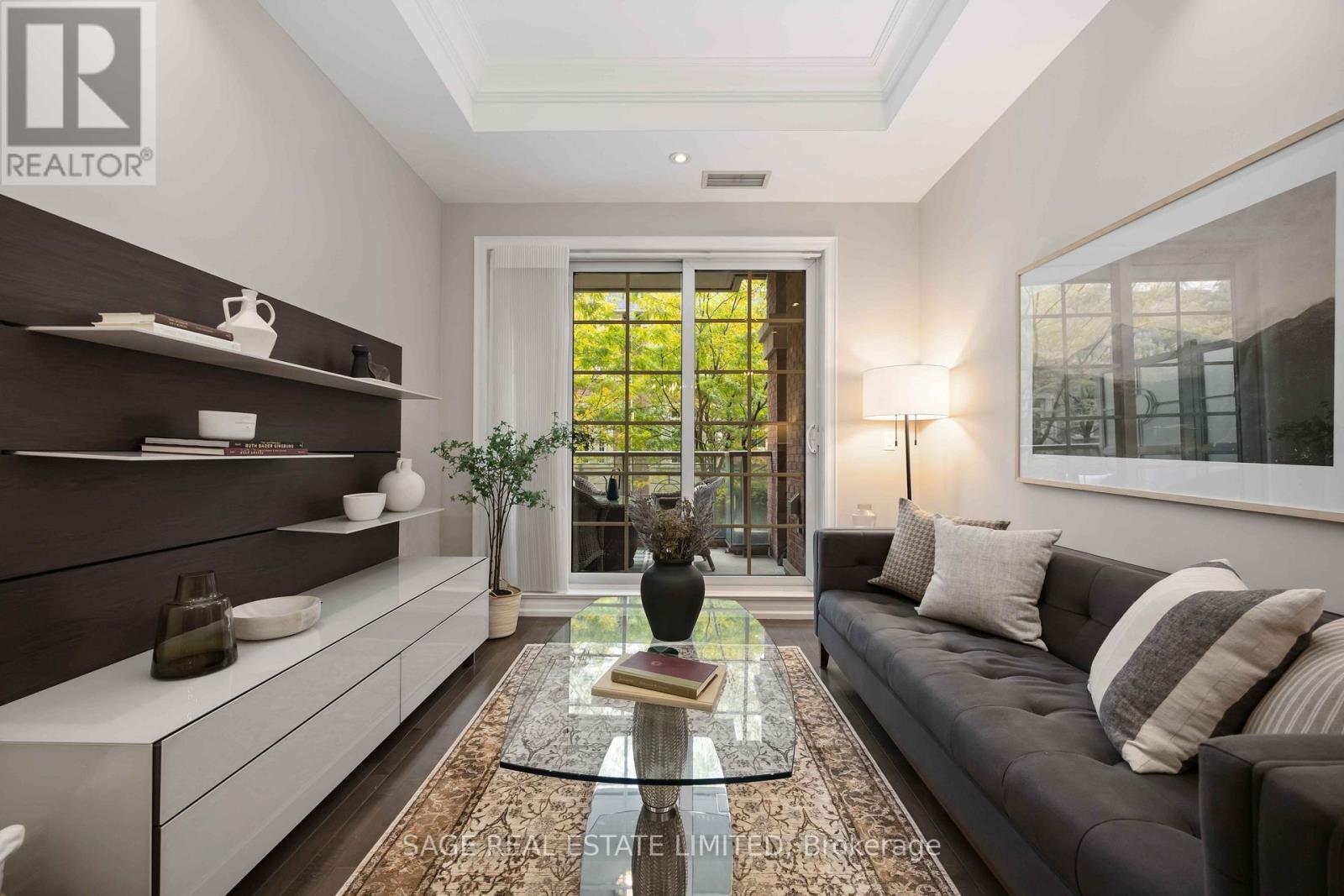 212 - 20 Burkebrook Place, Toronto, ON - Indoor Photo Showing Living Room