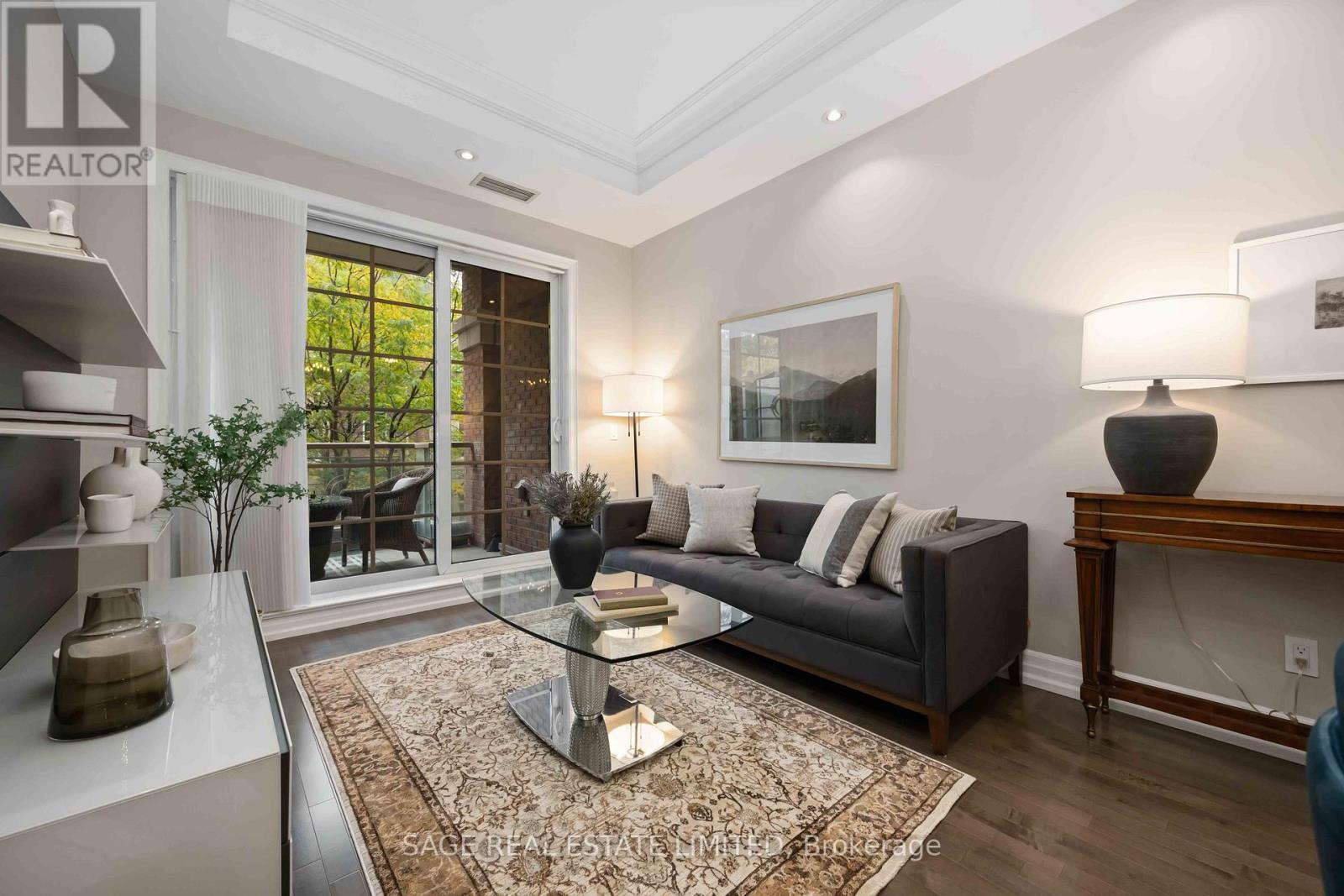 212 - 20 Burkebrook Place, Toronto, ON - Indoor Photo Showing Living Room