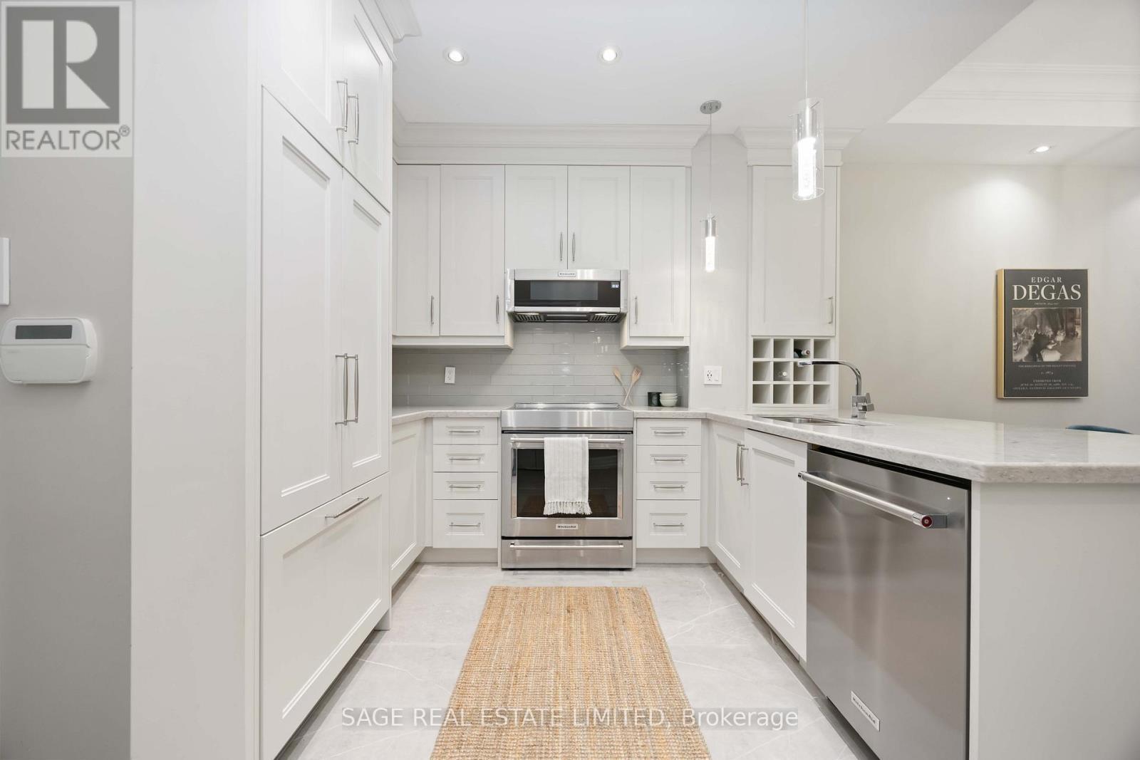 212 - 20 Burkebrook Place, Toronto, ON - Indoor Photo Showing Kitchen With Stainless Steel Kitchen With Upgraded Kitchen