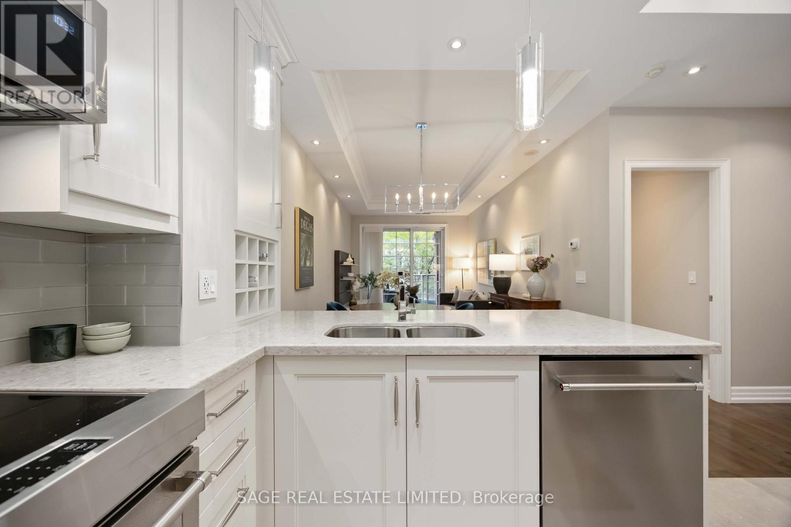 212 - 20 Burkebrook Place, Toronto, ON - Indoor Photo Showing Kitchen With Double Sink With Upgraded Kitchen