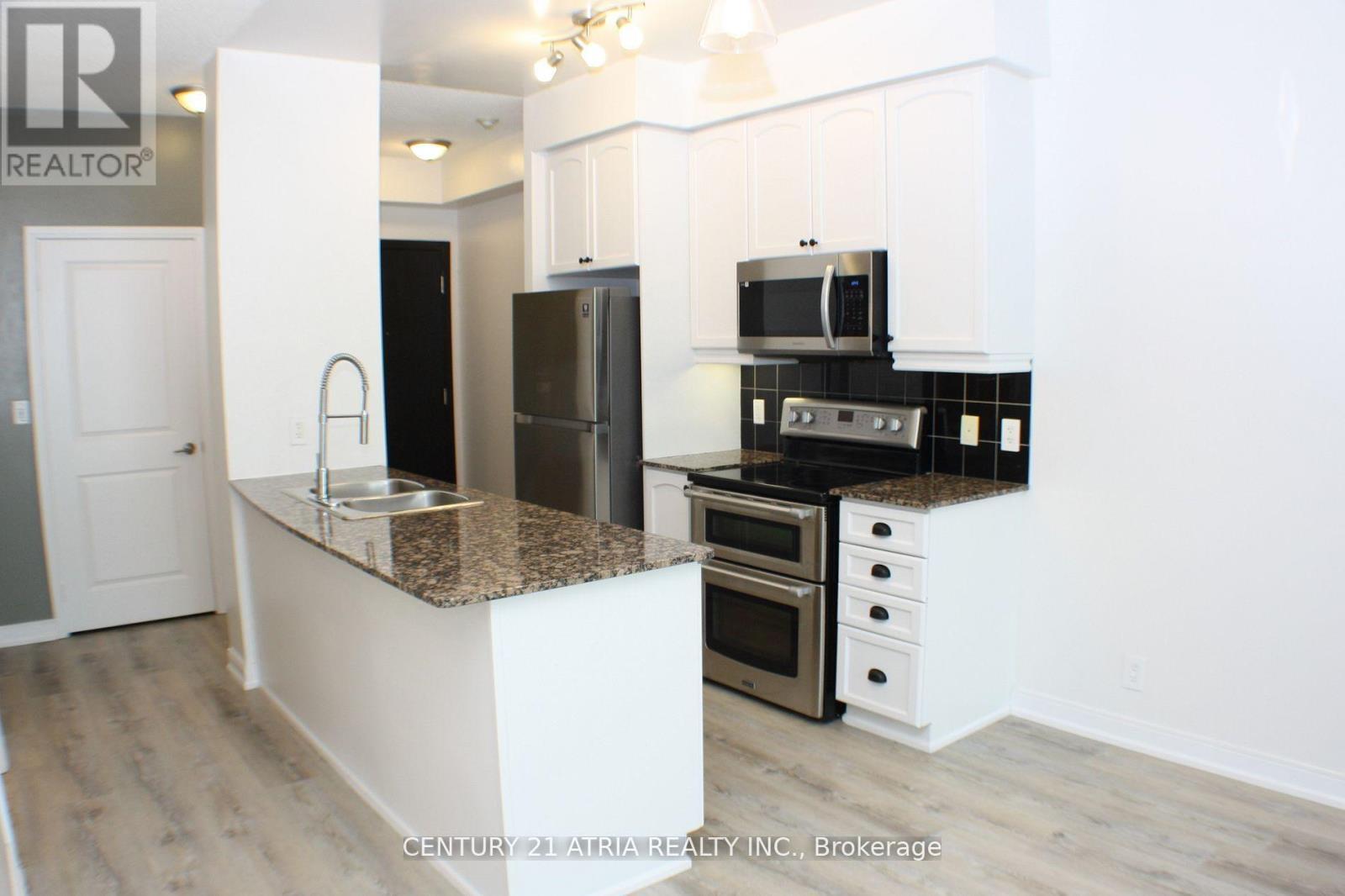 3010 - 80 Absolute Avenue, Mississauga, ON - Indoor Photo Showing Kitchen With Double Sink With Upgraded Kitchen