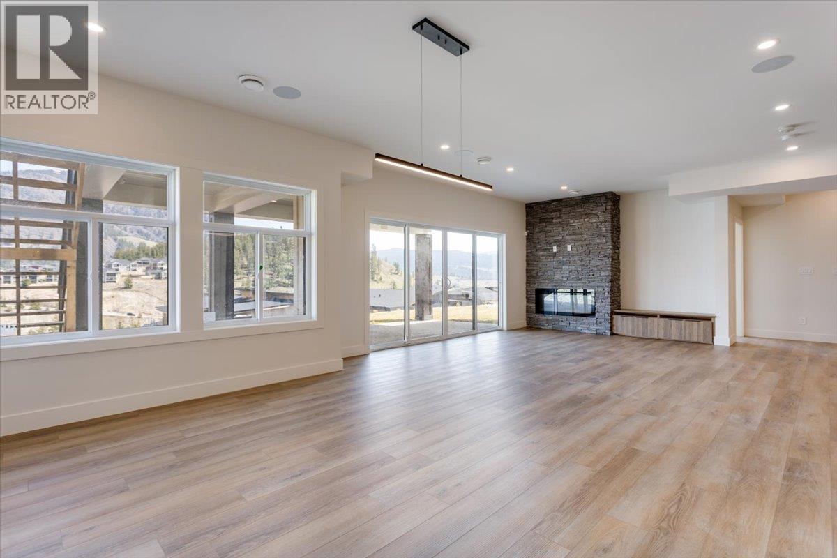 913 Carnoustie Drive Lot# 12, Kelowna, BC - Indoor Photo Showing Living Room With Fireplace