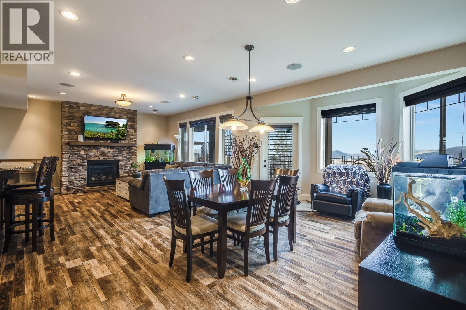 1830 Birkdale Avenue, Kelowna, BC - Indoor Photo Showing Dining Room With Fireplace