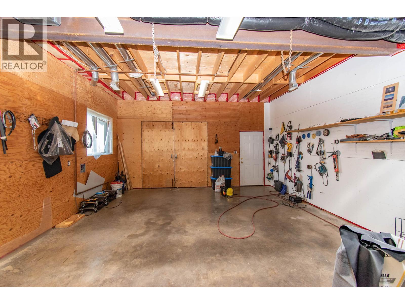 8020 Hislop Road, Telkwa, BC - Indoor Photo Showing Garage