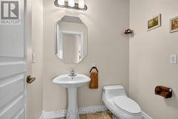 Powder Room off of Foyer -
