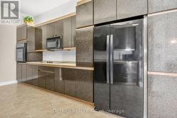 Galley Kitchen with an abundace of Cupboard Space -