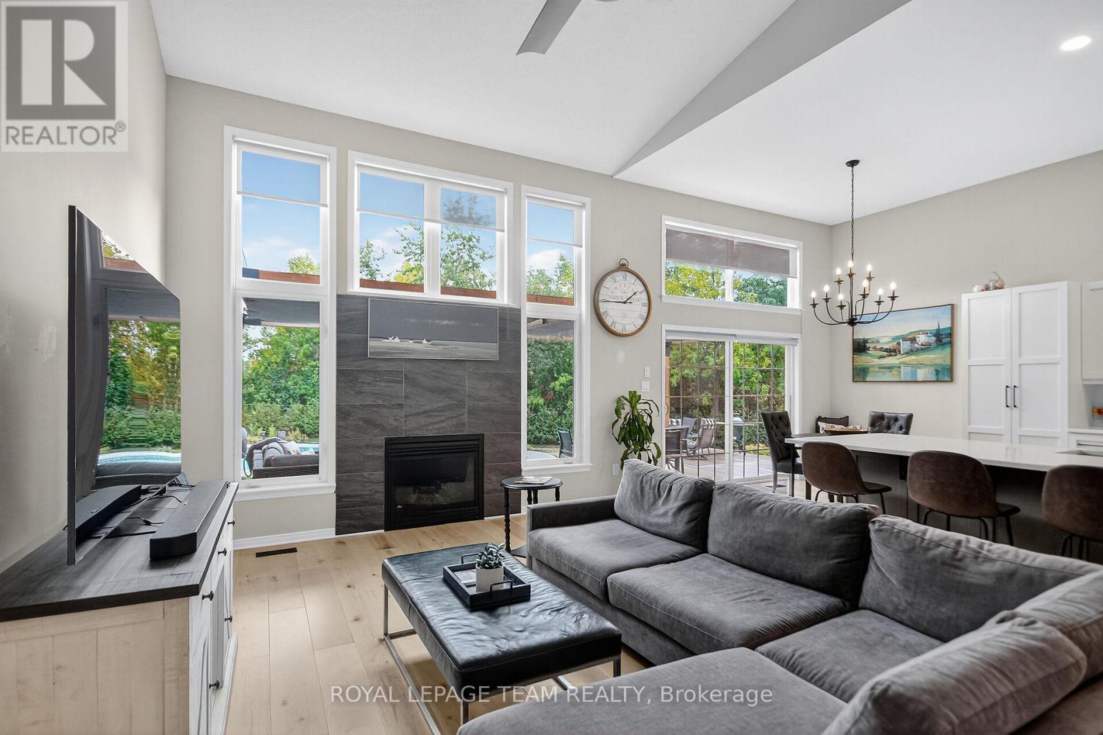 128 Chenoa Way, Ottawa, ON - Indoor Photo Showing Living Room With Fireplace