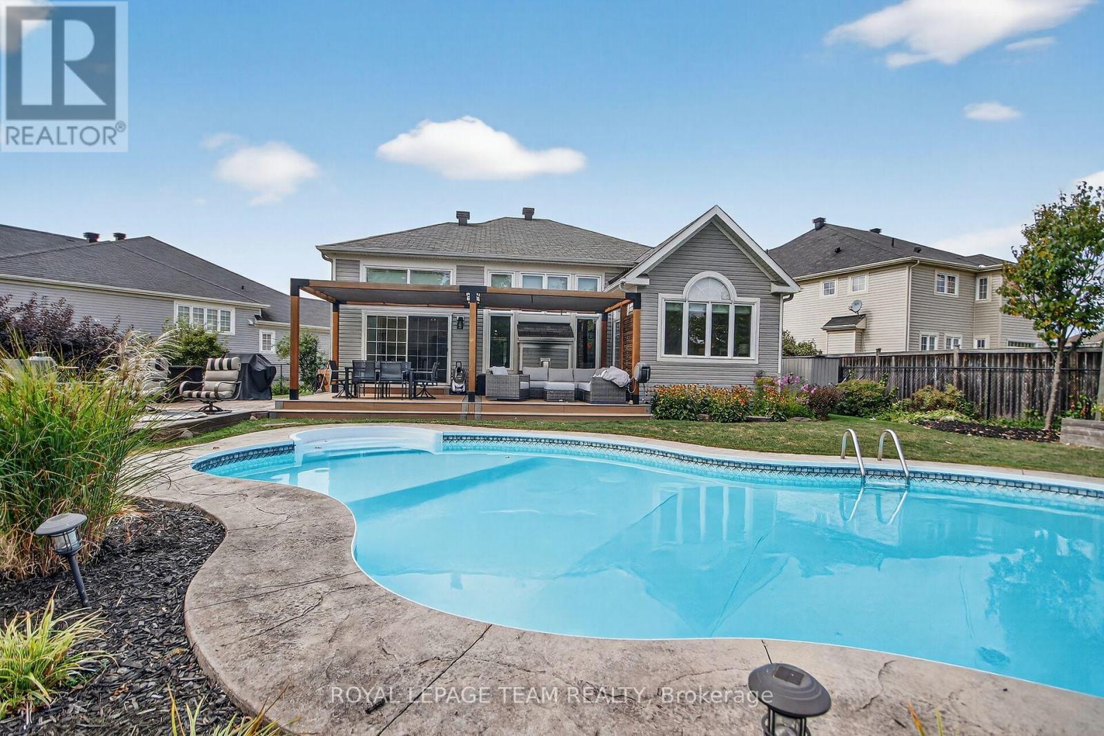 128 Chenoa Way, Ottawa, ON - Outdoor With In Ground Pool With Deck Patio Veranda With Backyard