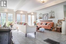 Garden Room overlooks backyard. -