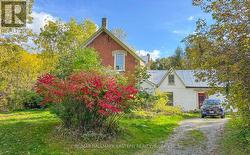 West wing addition with entrance to mudroom -
