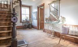 Front Foyer, (north wing) door to Living Room. -