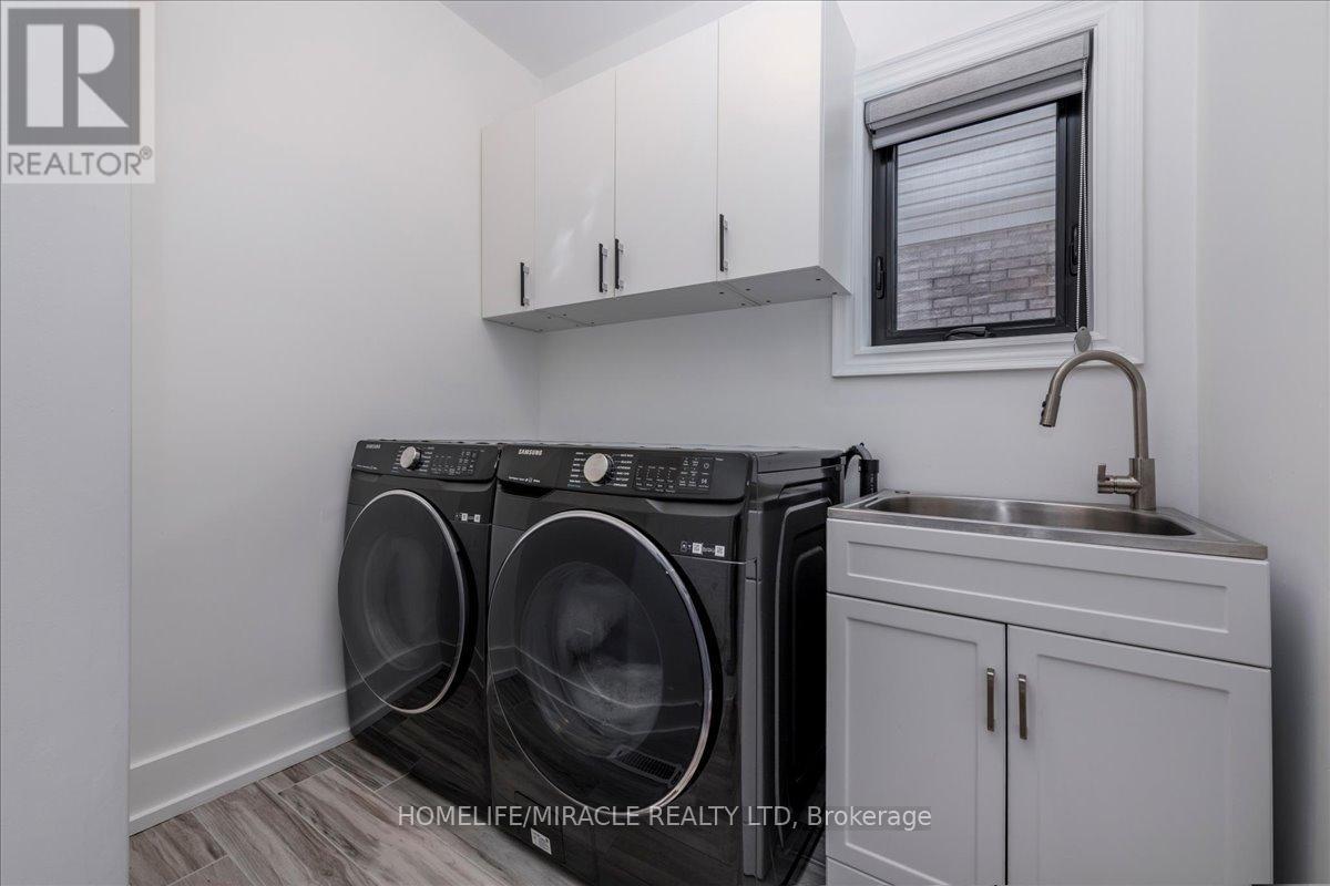 23 Knight Street, New Tecumseth, ON - Indoor Photo Showing Laundry Room